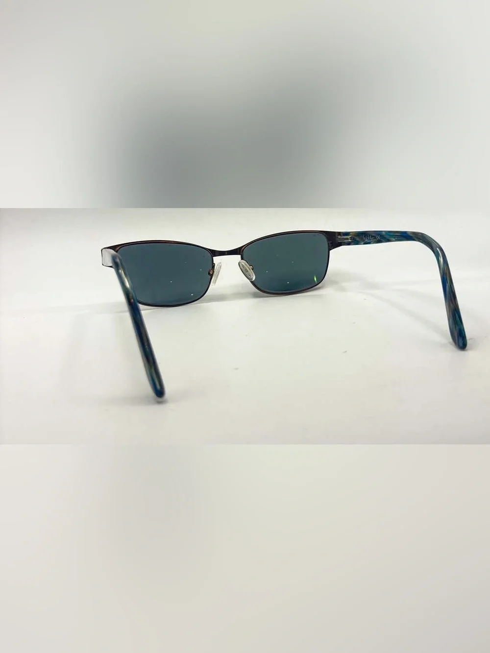 Nicole Miller listing pair